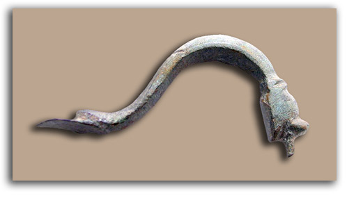 Image of bronze dragon handle.