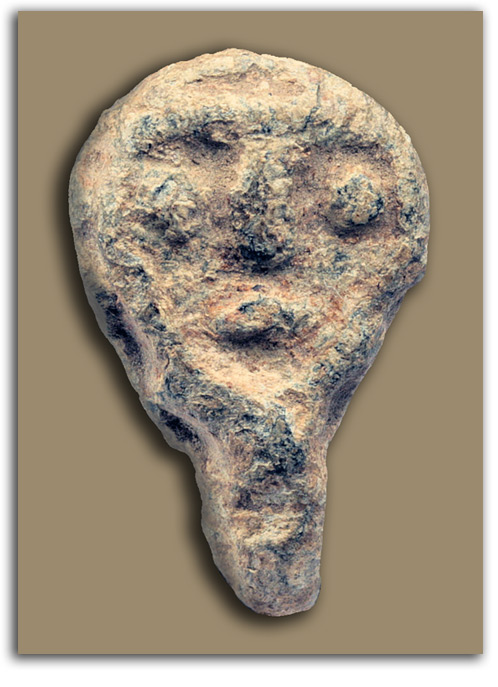 Image of doubleface stone carving.