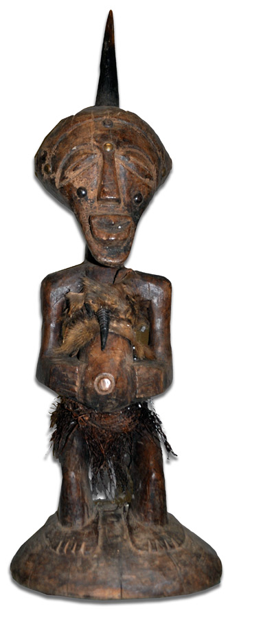 Image of Songe standing figure with horn in head.